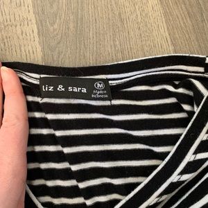 black and white striped tee. soft stretchy material says med but fits small